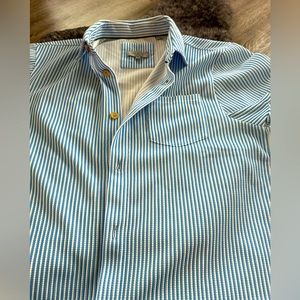 Men’s button up casual dress shirt. Brand new .Blue and white stripes